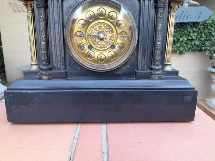 An Antique 19th Century French Style Black Slate Quartz Clock