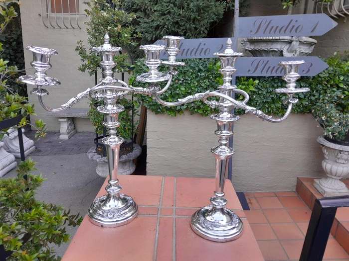 A 20th Century Pair Of Silver Plate Candelabra