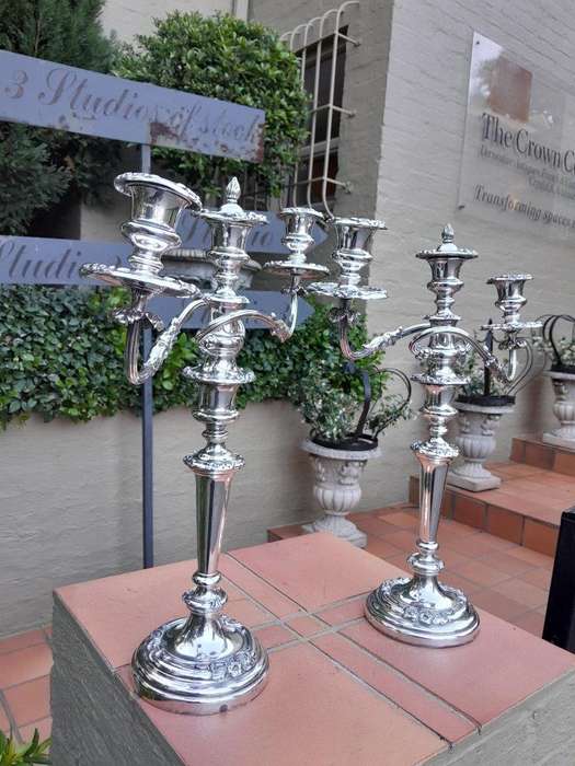 A 20th Century Pair Of Silver Plate Candelabra