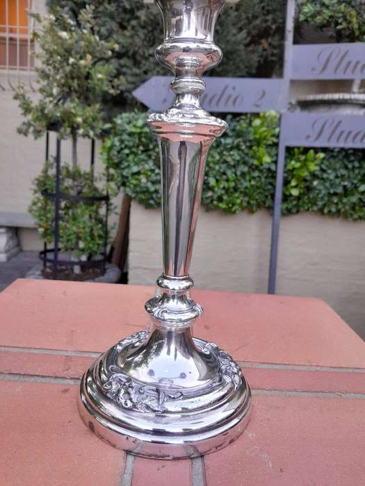 A 20th Century Pair Of Silver Plate Candelabra