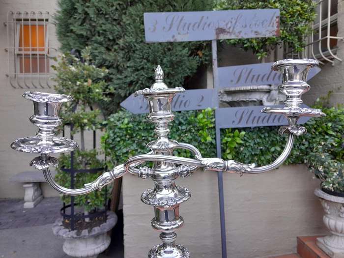 A 20th Century Pair Of Silver Plate Candelabra