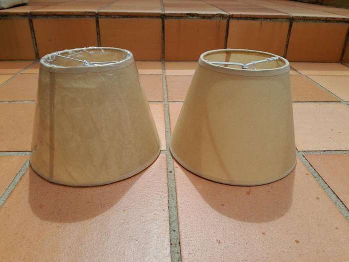 A 20th Century Pair Of Handmade Parchment Lampshades With Gold Painted Trim