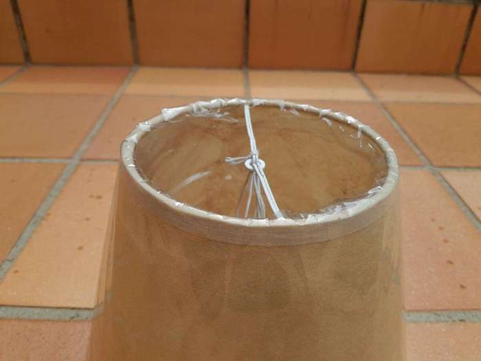 A 20th Century Pair Of Handmade Parchment Lampshades With Gold Painted Trim