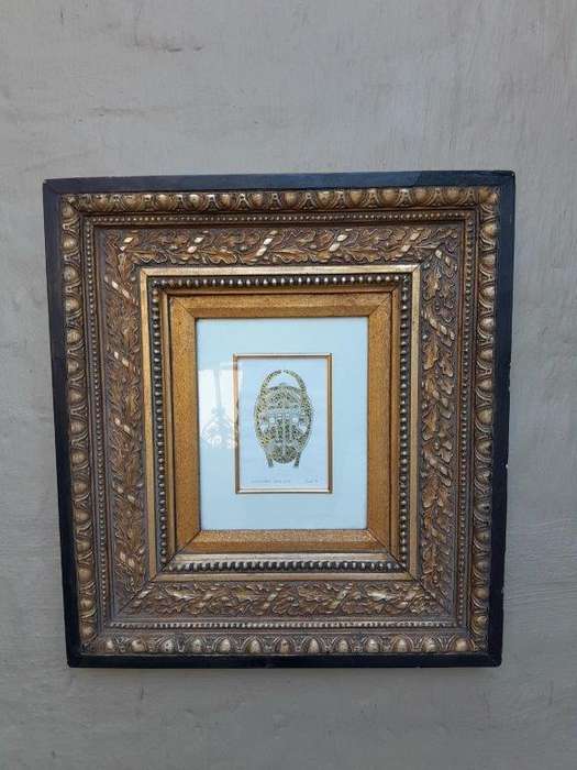 A 20th Century Ornately Framed Mask Signed