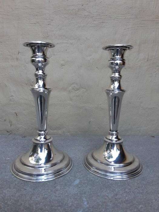 A 20th Century Pair Of Electroplate Candlesticks