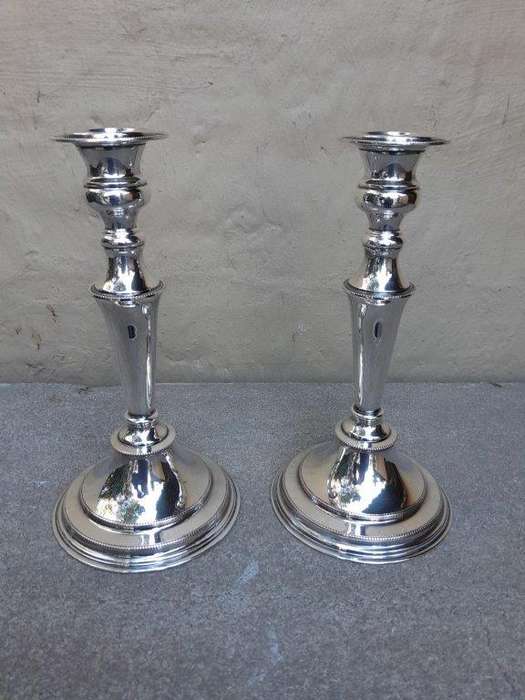 A 20th Century Pair Of Electroplate Candlesticks