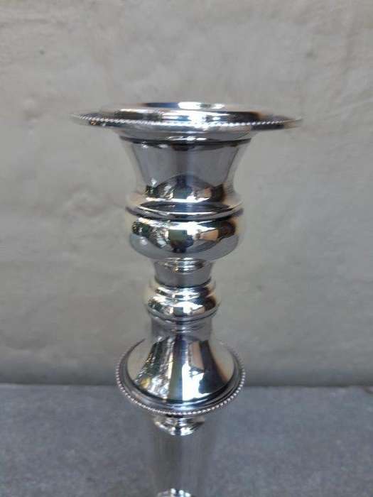 A 20th Century Pair Of Electroplate Candlesticks