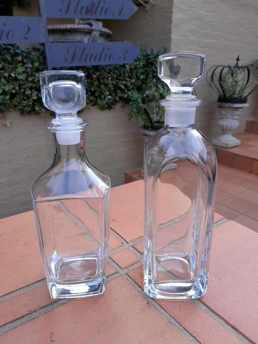 A Set Of Two Cut Glass Crystal Decanters