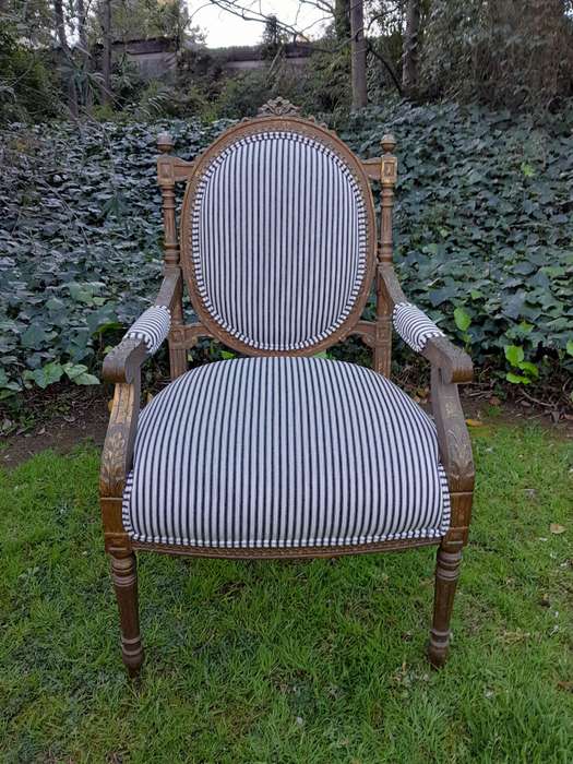 A Pair of 20th Century French Louis XV Style Gilded Armchairs Upholstered in a Ticking Fabric