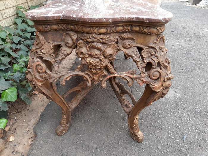 An 18th Century French Louis XV Ornately Carved and Gilded Console / Drinks Table with Marble Top