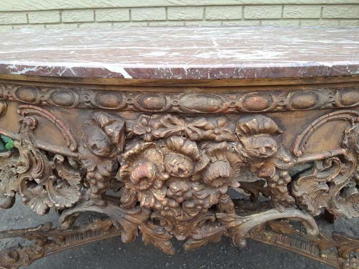 An 18th Century French Louis XV Ornately Carved and Gilded Console / Drinks Table with Marble Top