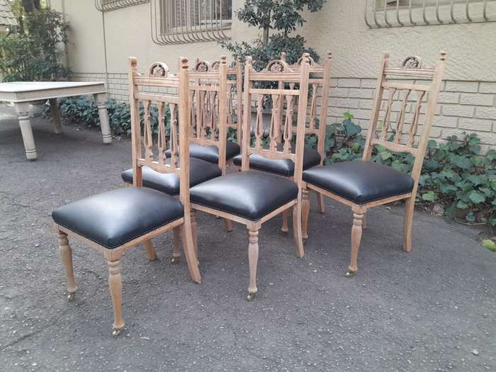 An Antique Edwardian Set of Six Mahogany Chairs Upholstered in Black Leather in a Contemporary Bl...
