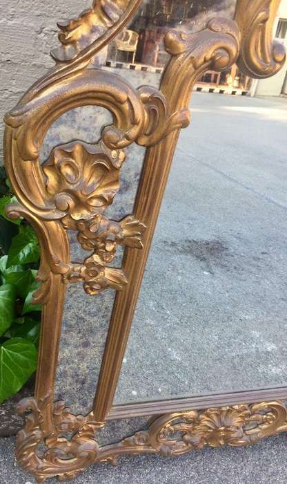 Gilded and Ornately Carved Wooden Mirror. Belgium. Circa 1974