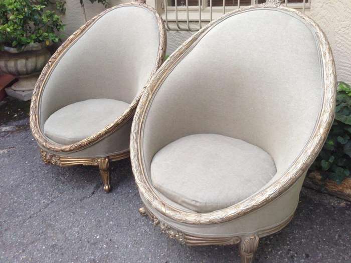 A Pair of French Empire Style Carved and Gilded Arm / Tub / Bergere Chairs Upholstered in an Impo...