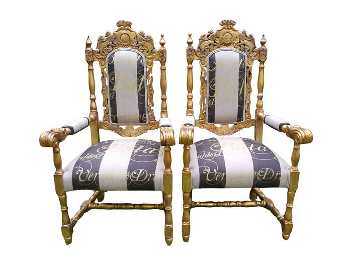 Pair of 19th Century carved teak and gilded in gold leaf open arm throne chairs         ...