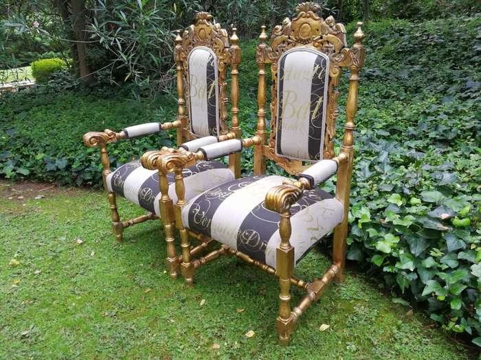 Pair of 19th Century carved teak and gilded in gold leaf open arm throne chairs         ...