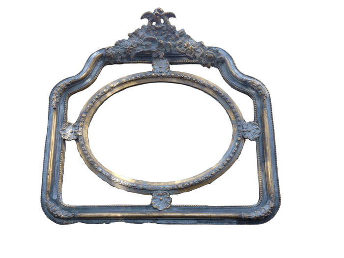 A French Ornate carved painted mirror with a bevelled centre section