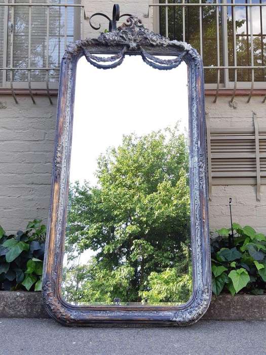 An Ornate Carved & Bevelled Painted Mirror