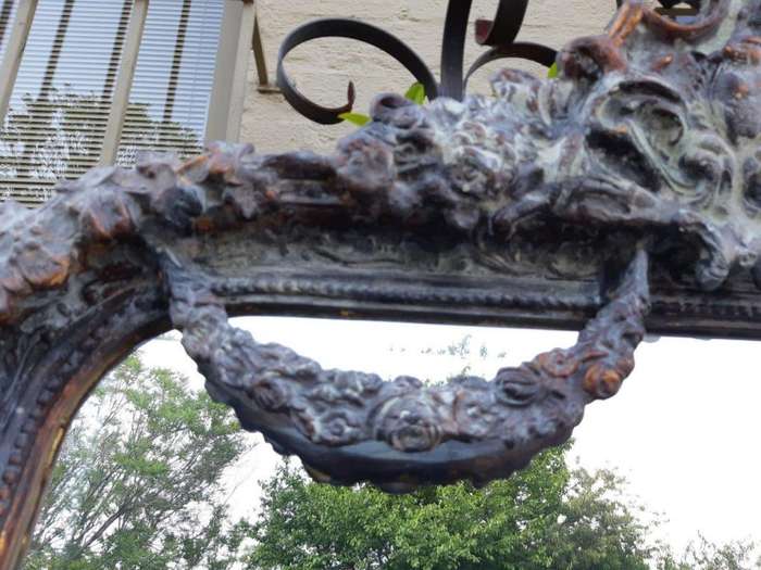 An Ornate Carved & Bevelled Painted Mirror