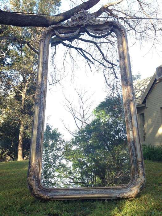 An Ornate Carved & Bevelled Painted Mirror