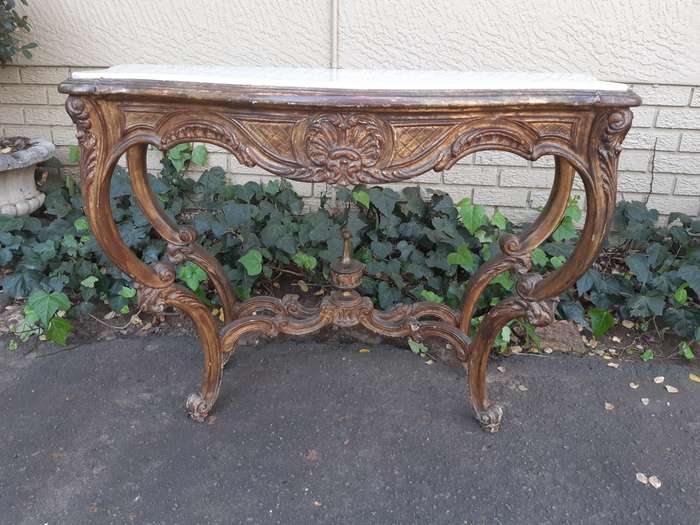A 19th century French giltwood and marble-topped console table