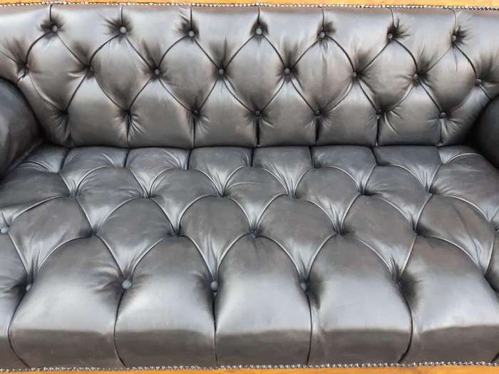 A Biedermeier Settee Covered in Leather and Deep Buttoned Circa Early 20th Century