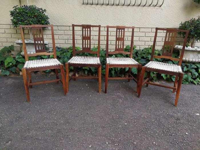A Set Of Four (4) Bleached / Natural Mid Century Wood Riempie Chairs
