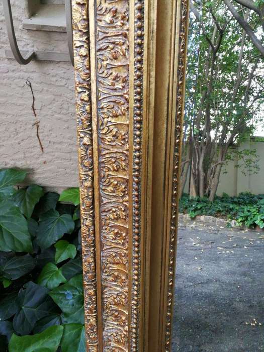 A Massive And Ornately Framed Gilded Mirror With Bevelled Mirror - ND