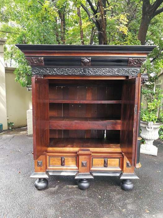 A 19th Century Dutch Heavily Carved Oak and Ebony Kussingkast / Cupboard on Bun Feet  (Useful for...