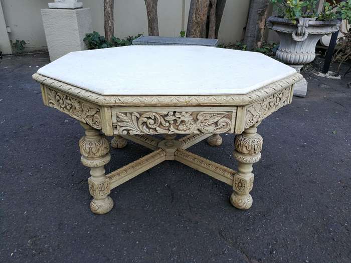 19th Century carved oak octagonal table with five drawers on bun feet