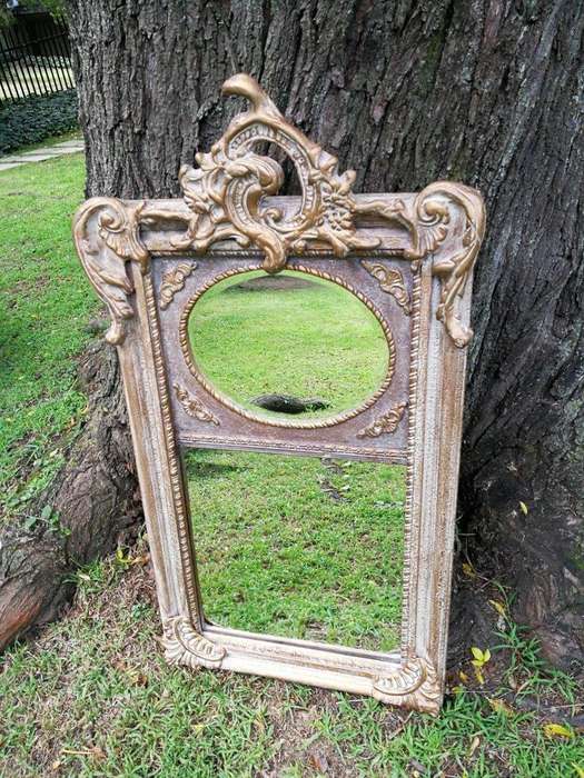 Ornately Carved Oval Gilded Mirror