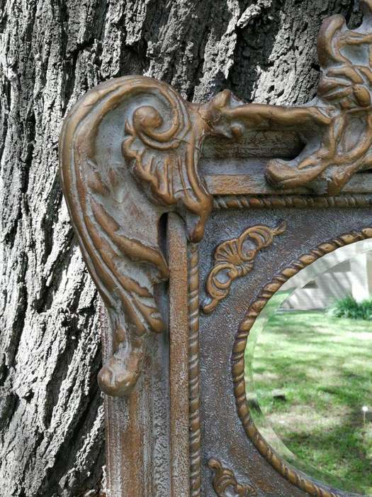Ornately Carved Oval Gilded Mirror