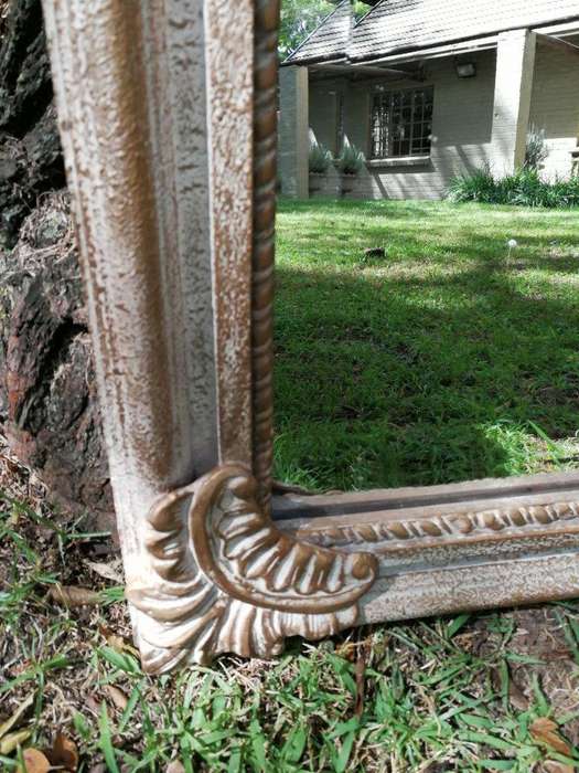 Ornately Carved Oval Gilded Mirror