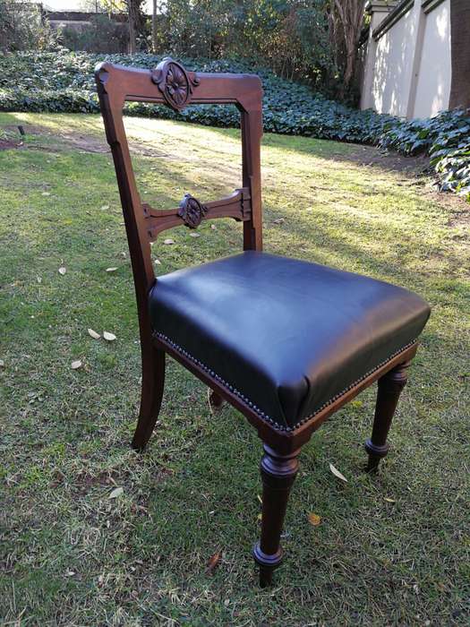 Set of six early Victorian chairs upholstered in black leather upholstered