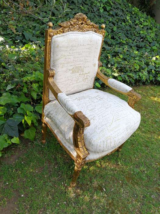Pair of 19th Century style gilded and carved armchairs
