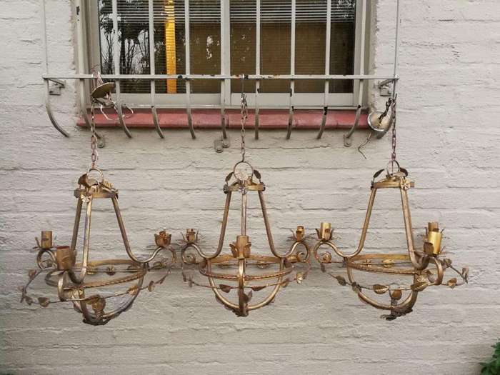 Set of three hanging gilt-metal chandeliers for candles ND