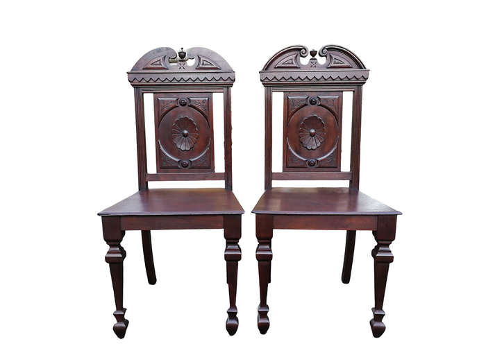 A Pair Of Victorian Mahogany Hall Chairs
