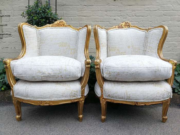 A Pair Of 20th Century French Style Gilt Bergere Armchairs Upholstered In A Custom-Made Hand Prin...