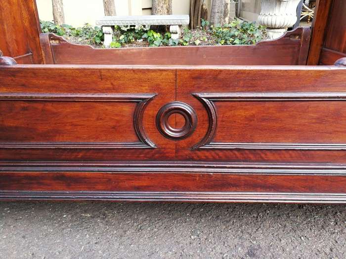 A Carved Mahogany Lit-Bateau