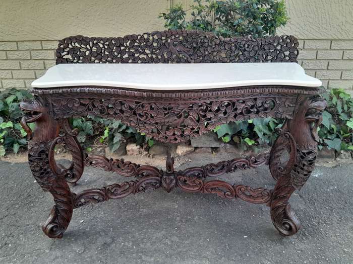 A near pair of Anglo Indian Rosewood Serpentine Console / Server Tables (one 19th Century and one...