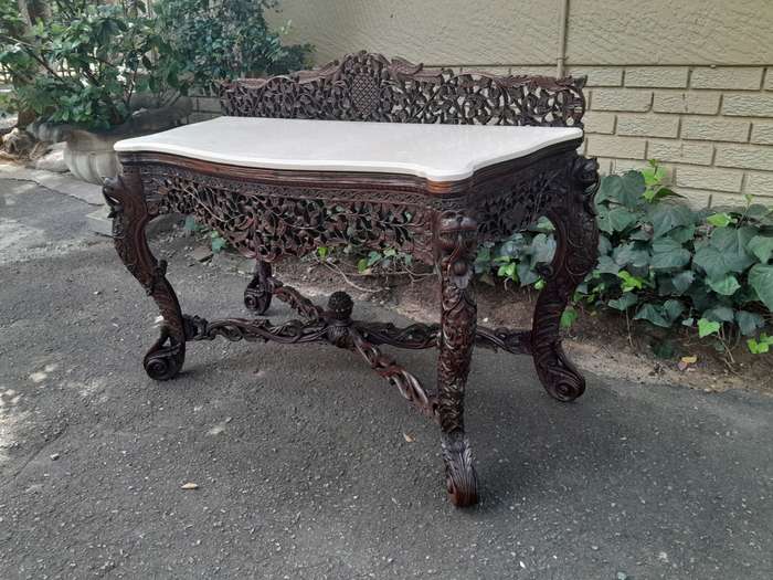 A near pair of Anglo Indian Rosewood Serpentine Console / Server Tables (one 19th Century and one...