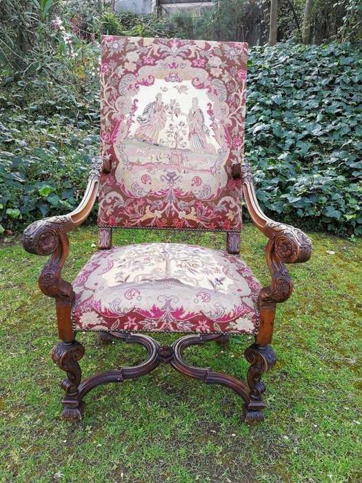 A 19th Century Walnut Louis Fourteenth Style Chair Elaborately Carved And With A Splendid Origina...