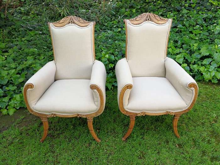 A Pair Of 1920s Bleached / Natural Carved Oak Armchairs upholstered