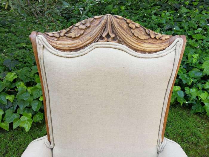 A Pair Of 1920s Bleached / Natural Carved Oak Armchairs upholstered