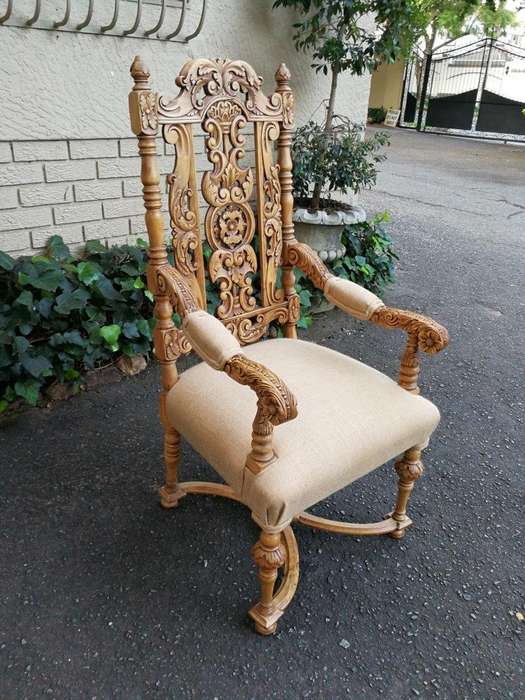 A Flemish Style Carved Wooden Armchair