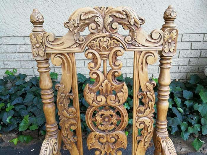 A Flemish Style Carved Wooden Armchair