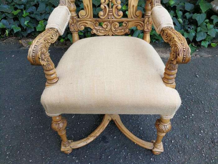 A Flemish Style Carved Wooden Armchair