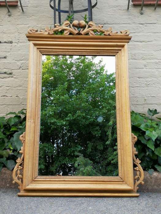 An Early 1900s (Possibly Victorian) Ornately Carved Natural Wooden Mirror