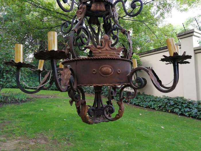 An Imported French Crown Design Wrought Iron Hand Painted Chandelier With 8 Arms