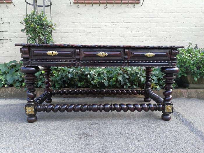 A 19th Century Portuguese Rosewood and Brass-mounted Writing Table With a Gilt-tooled Leather Wri...